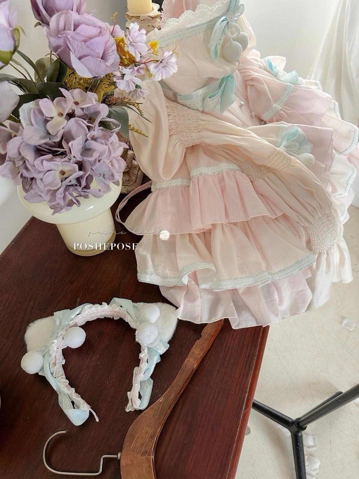 Delicate mint lullababy wonderland dress with baby-blue lace by Poshepose Global.