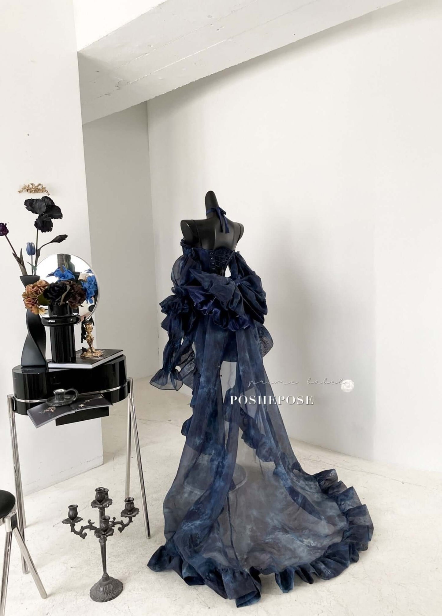 Haute Couture Deep Sea Dress Limited Edition showcased on a mannequin in a stylish boutique setting, exuding elegance.