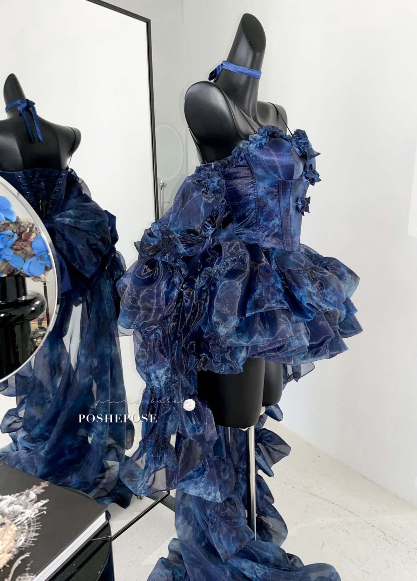 Haute Couture Deep Sea Dress Limited Edition on mannequin showcasing gothic and Lolita influences with deep blue layers.