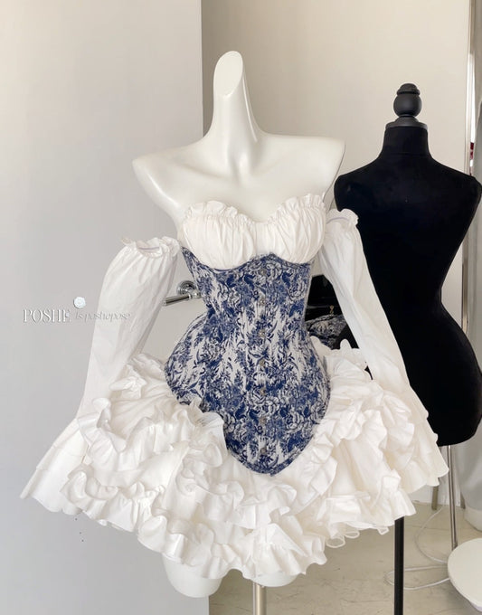 Rococo Laurel Poem Structured Corset in Caviar Blue with white ruffled skirt by Poshepose Global.