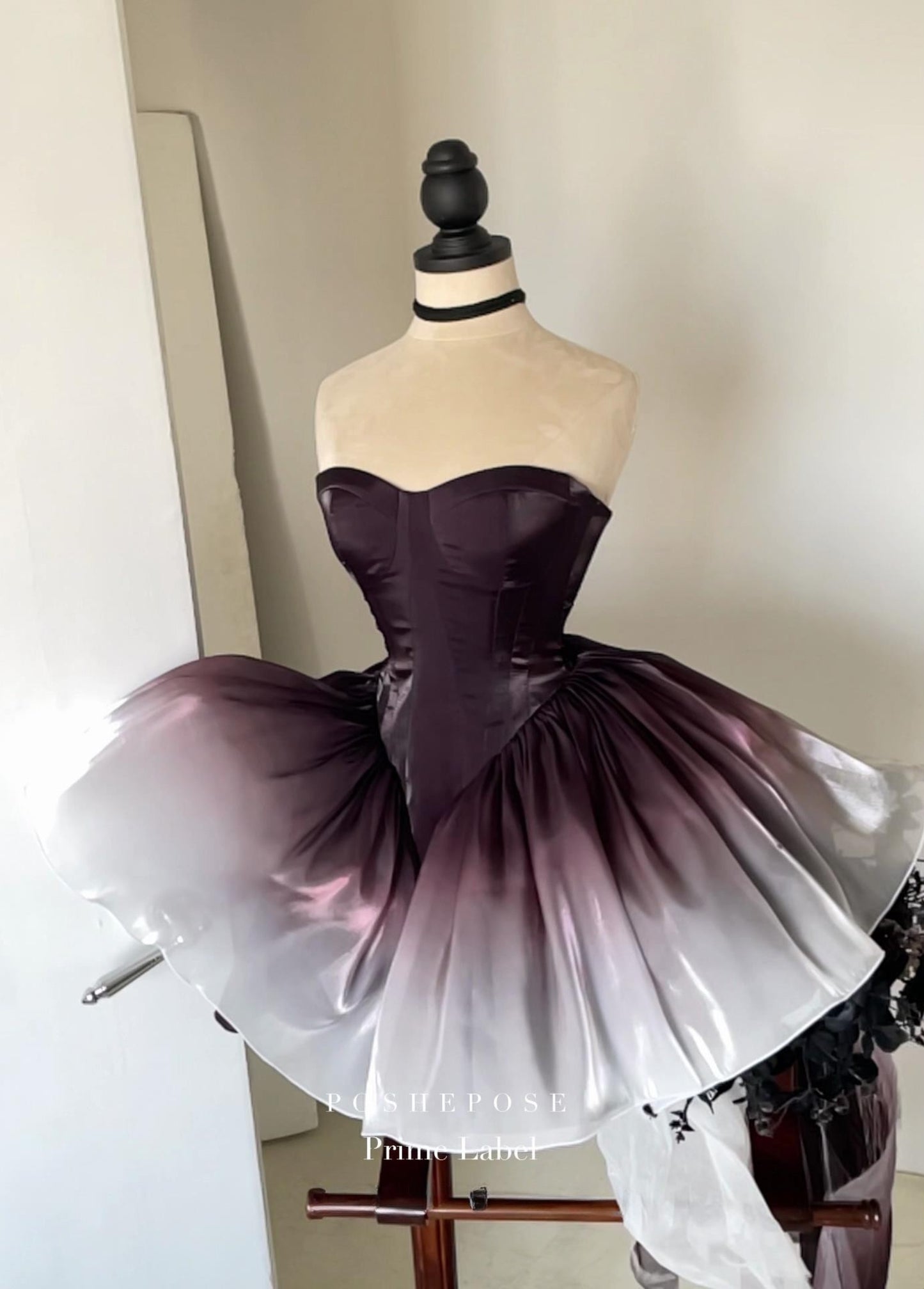 Luxury couture Black Swan dress with multilayered gradient fabric.