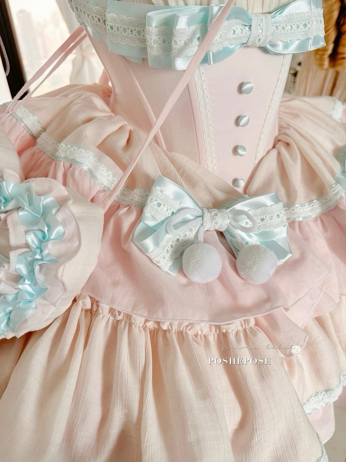Mint lullababy wonderland lolita outfit with bows, lace, and layered chiffon.
