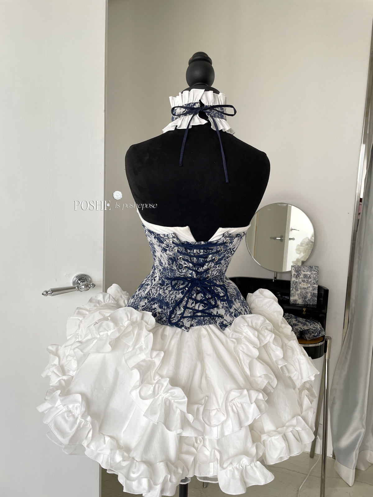 Caviar Blue Rococo corset dress featuring baroque floral patterns and layered ruffles by Poshepose.