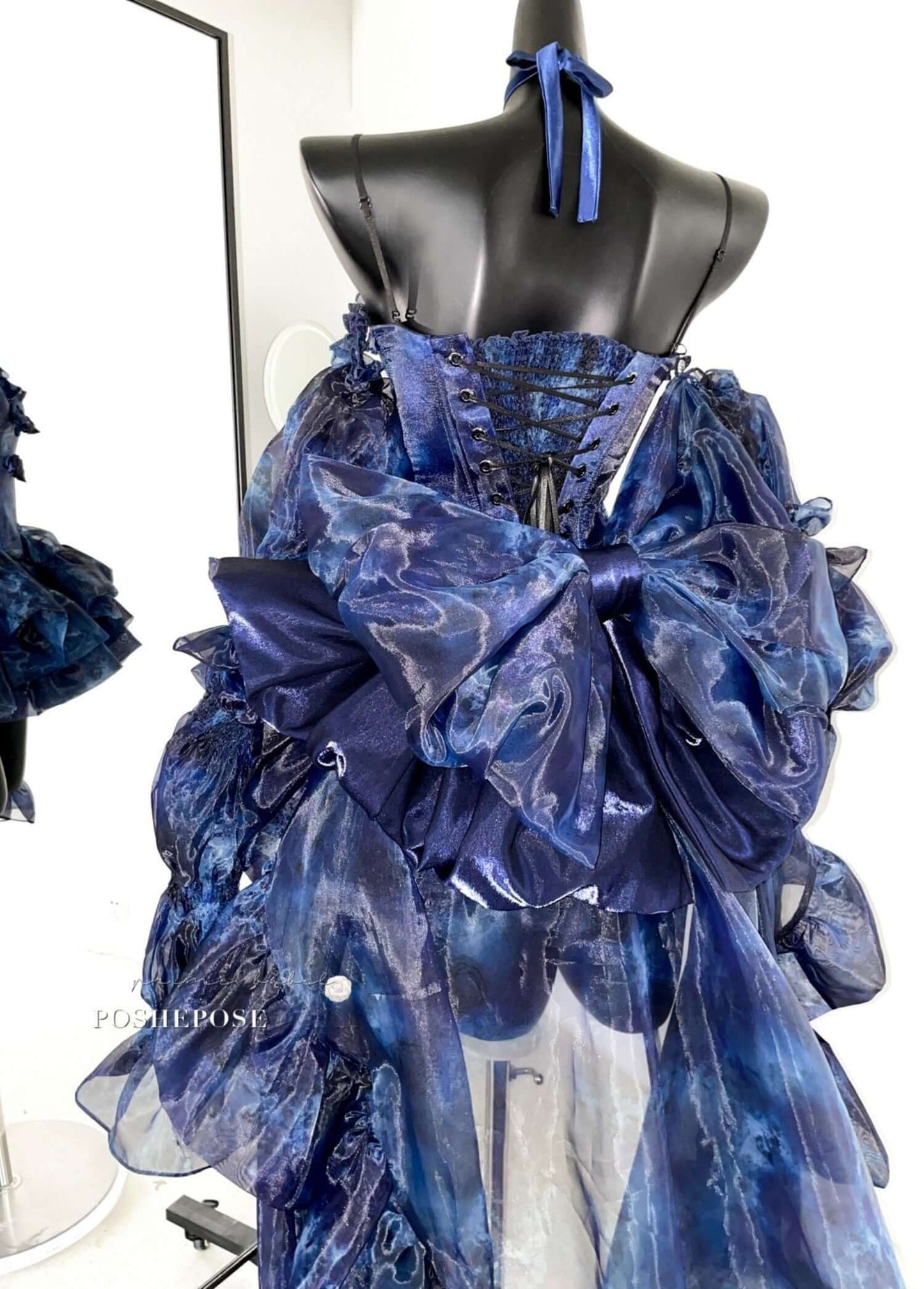 Haute Couture Deep Sea Dress Limited Edition showcasing gothic grace and dreamlike silhouette in shades of blue.