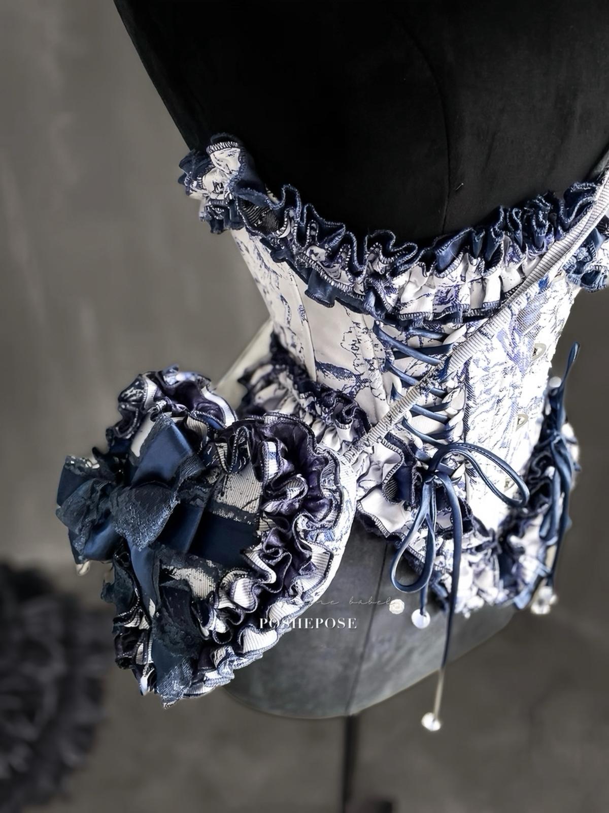 Aristocratic navy lolita outfit with detailed lace trims and baroque styling.