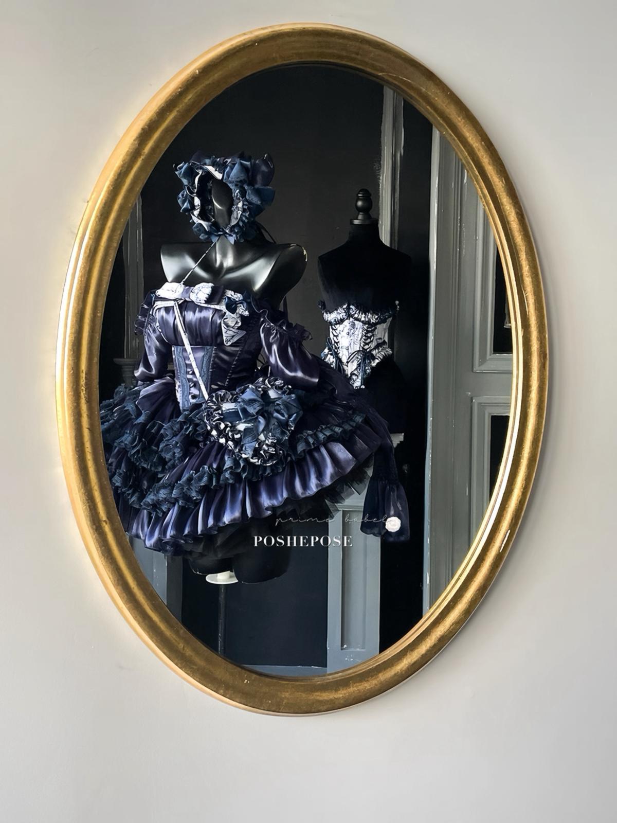 Midnight blue gothic lolita corset dress with dramatic Rococo flair.