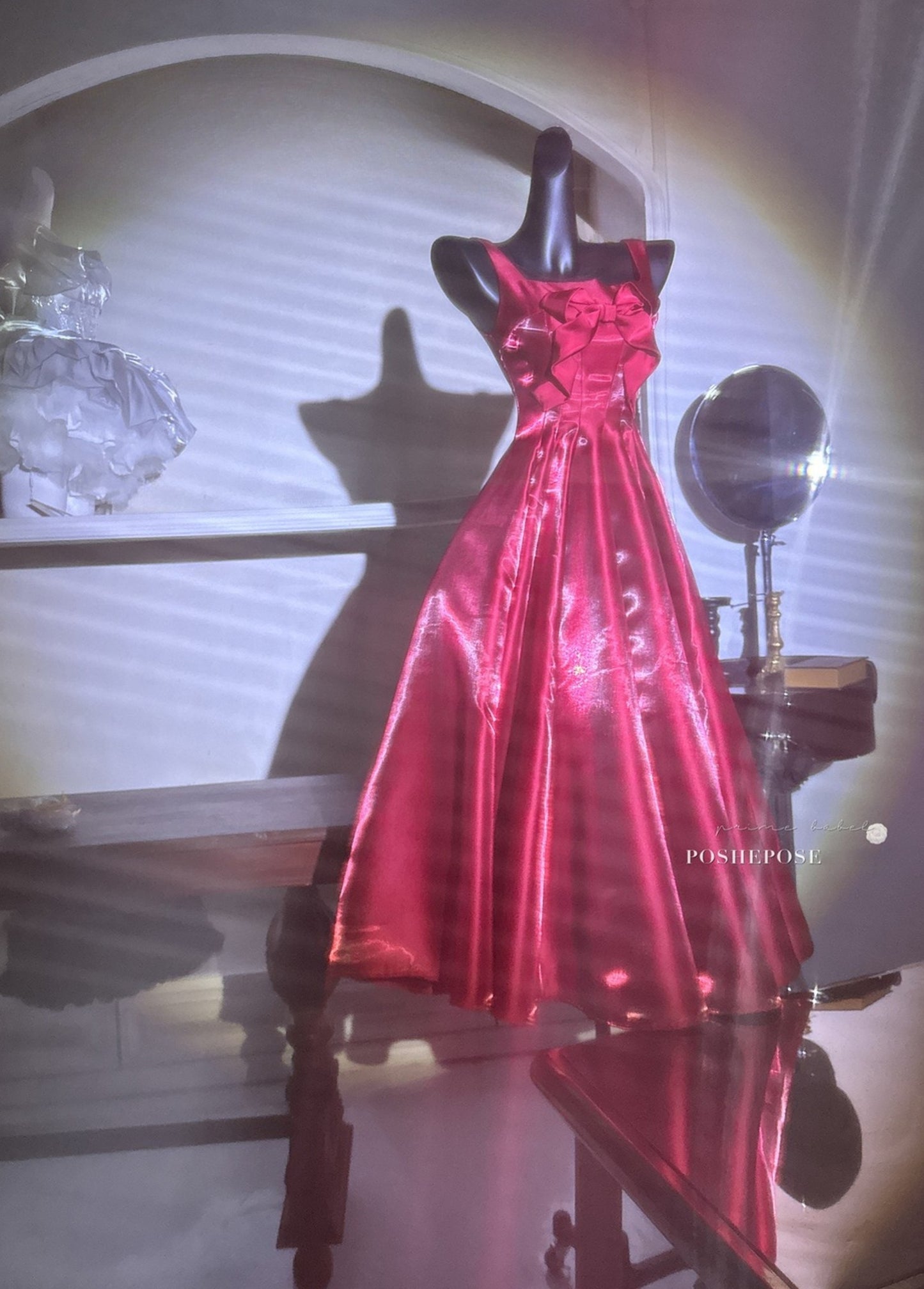 Luxury red satin gown designed for festive elegance