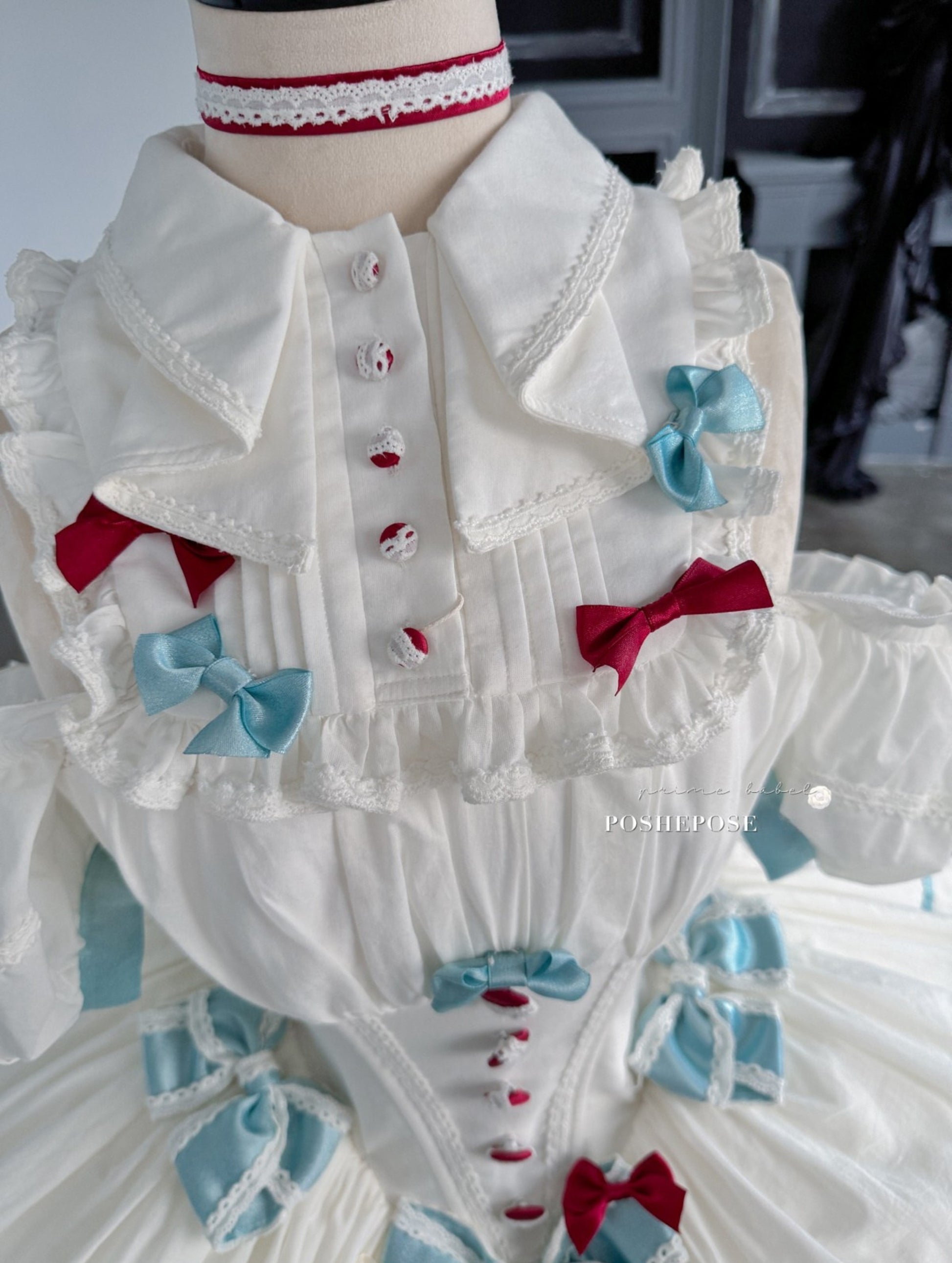 Poshepose Global dream dress with layered skirt and lace collar.