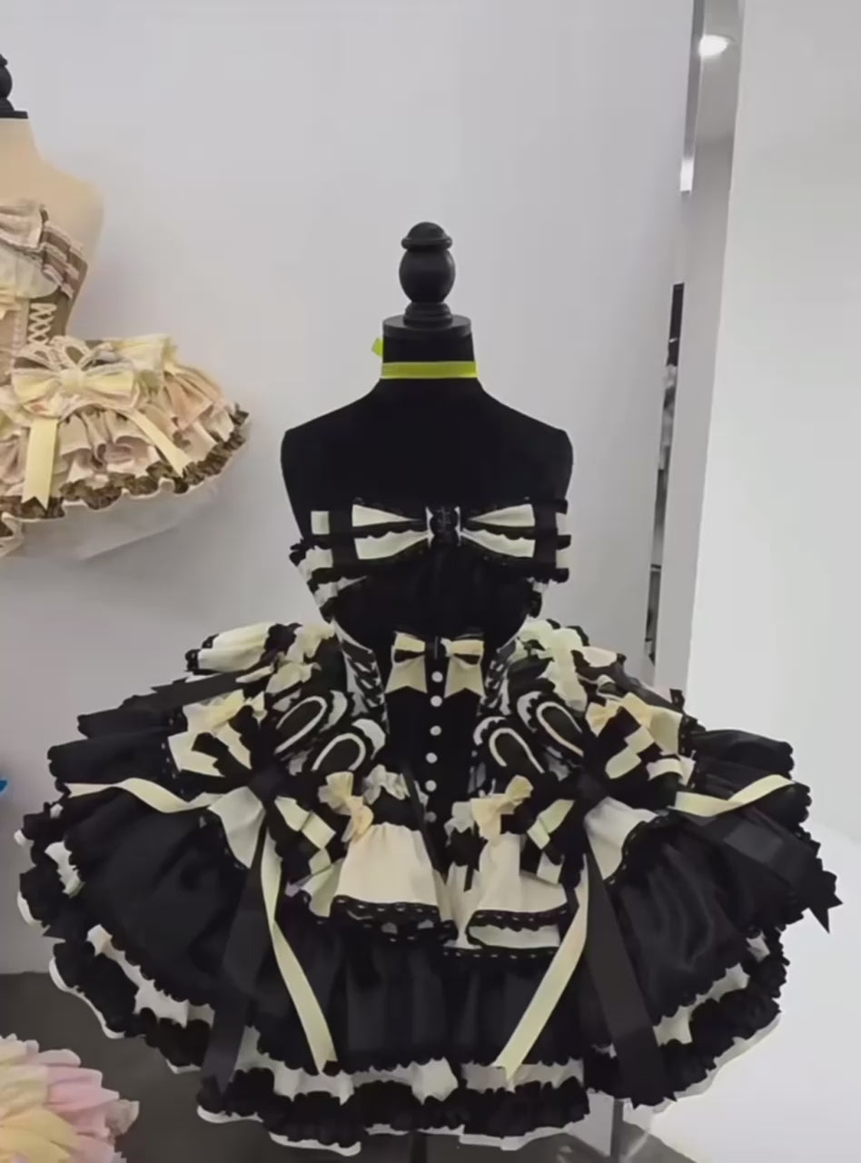 Sweet Dream Black Dress worn by model, black and yellow idol-style Lolita outfit.