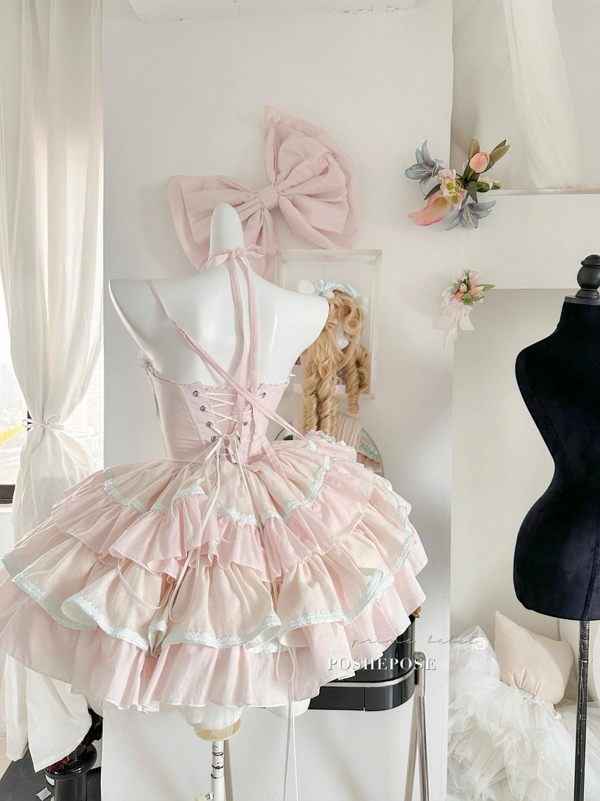 Victorian-inspired sweet lolita dress with mint ribbons and corset waist, handmade by Poshepose Global.